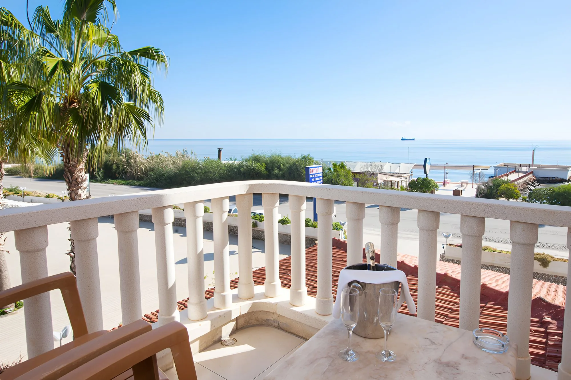Balcony with palms
